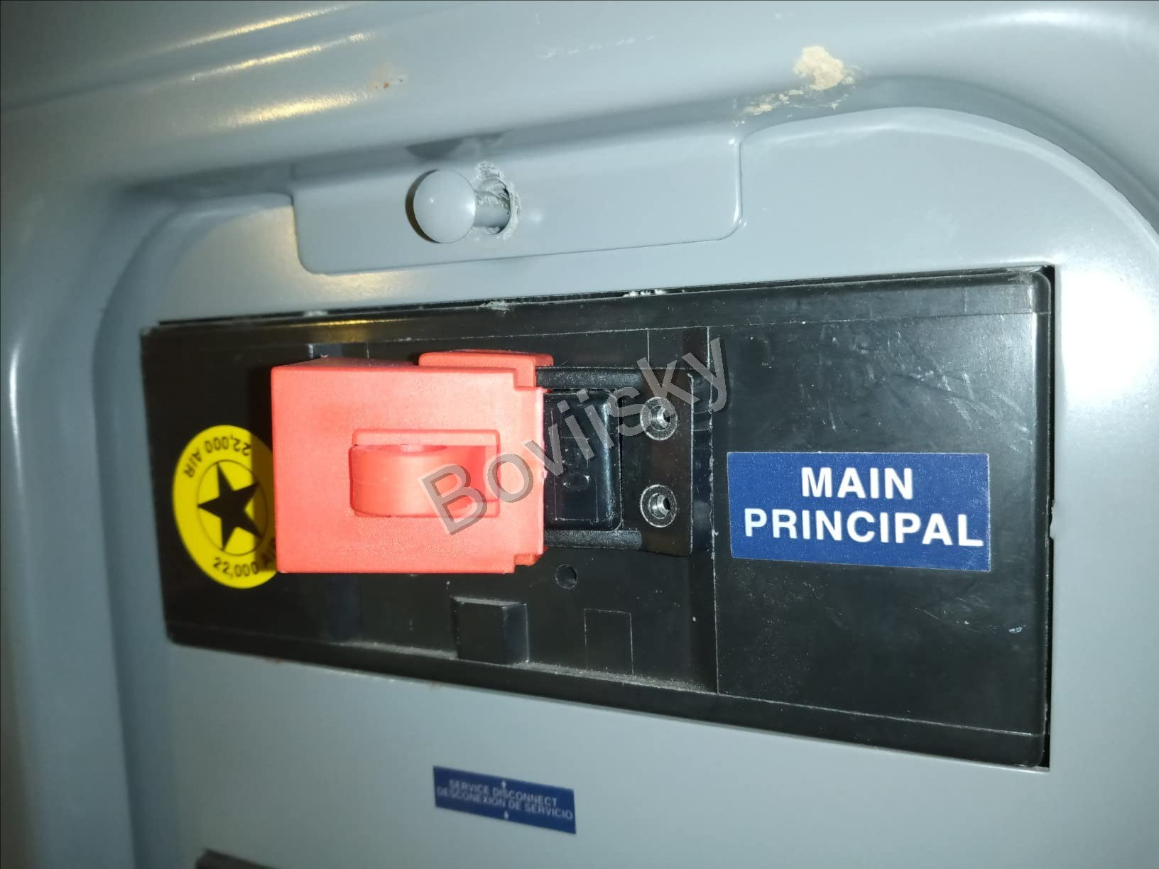 Main electrical breaker secured with a breaker lockout device